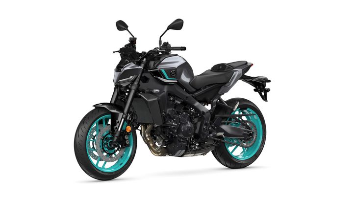 A modern motorcycle with a sleek design featuring a black body, teal wheels, and silver accents, positioned on a white background.