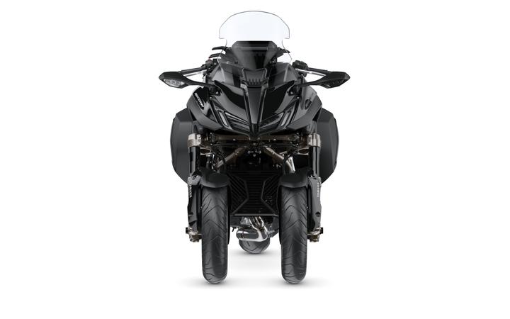 A sleek, black motorcycle viewed from the front, showcasing its dual front tires and aerodynamic design, with a transparent windscreen and intricate detailing on the handlebars and body.