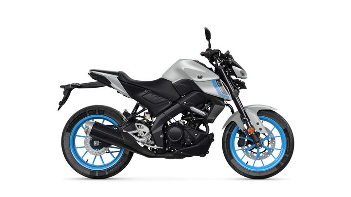A sleek, modern motorcycle design in silver and black with blue accents, showcasing a profile view of the bike including the wheels, exhaust, and handlebars.