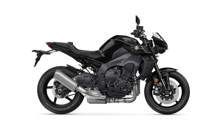 A sleek black motorcycle with a sporty design, featuring a prominent engine, dual exhaust, and modern technology accents, set against a white background.