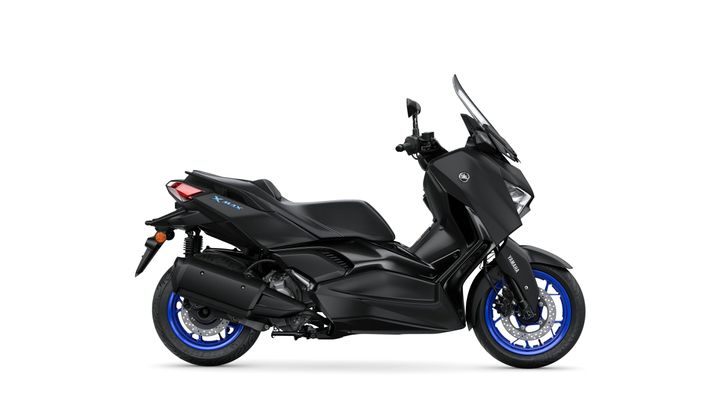 A sleek black scooter with blue wheels and modern design features, parked against a plain white background.