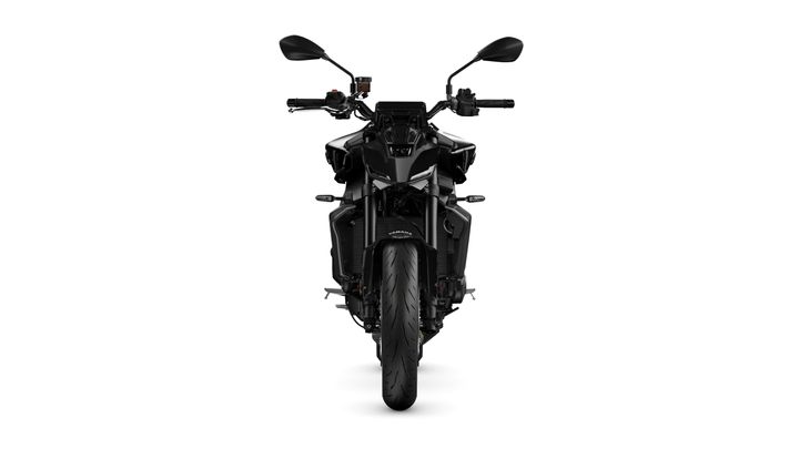 Front view of a sleek black motorcycle with distinct features including a strong headlight design, raised handlebars, and a thick rear tire. The background is plain white, emphasizing the bike's details.