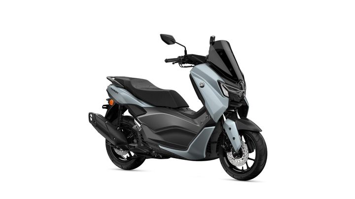 A modern, sleek scooter in a light blue and black color scheme, featuring a prominent front shield, stylish curves, and a comfortable seat, positioned at a slight angle.