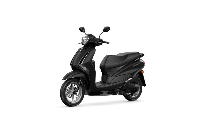 A sleek black scooter with a modern design, featuring a round headlight, comfortable seat, and a stylish body, displayed against a white background.