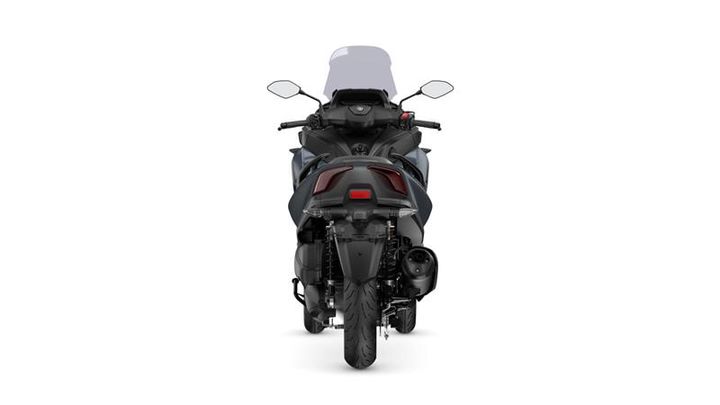 A rear view of a motorcycle, showcasing its sleek design, dual mirrors, and distinctive tail lights against a white background.