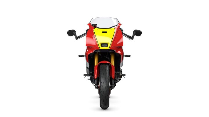 A front view of a sleek motorcycle featuring a bold red and yellow color scheme, with prominent mirrors and an aerodynamic design.