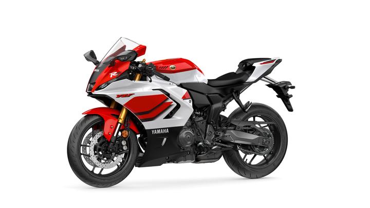 A red and white Yamaha YZF-R1 motorcycle is displayed at an angle, showcasing its sporty design, aerodynamic features, and modern styling, set against a white background.