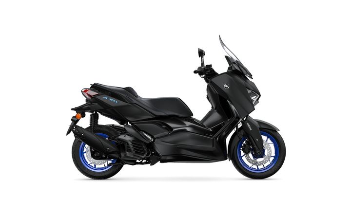 A sleek black Yamaha XMAX scooter with blue accents, showcasing its modern design and features from a side view.