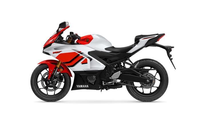 A sleek, modern motorcycle with a predominantly white body, accented by red and black elements, shown from a side view. The bike features a sporty design, with prominent wheel rims, a prominent front fairing, and a streamlined seat.