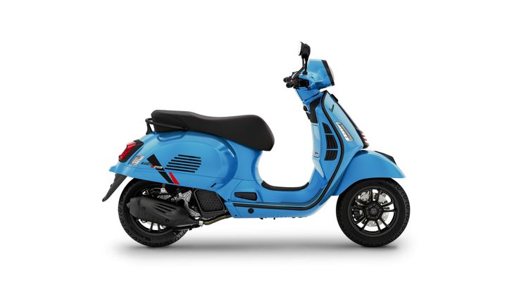 A sleek blue scooter is shown in profile, featuring a sporty design with black accents and a comfortable seat.
