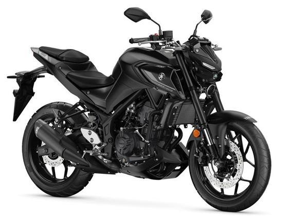 A sleek black motorcycle with a modern design, featuring a low seat, sporty frame, and distinctive headlights.
