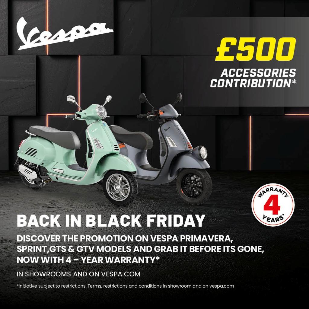 A promotional image featuring two Vespa scooters, one mint green and one charcoal gray, set against a dark background with a prominent white Vespa logo. The text highlights a £500 accessories contribution, Black Friday promotion, and a 4-year warranty on selected models.