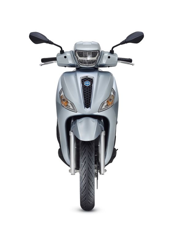 Front view of a silver scooter with a sleek design, featuring a distinctive front grille, two mirrors, and a single front tire.