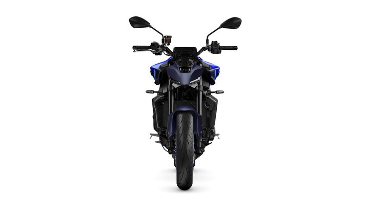 A front view of a sleek black and blue motorcycle, showcasing its angular design, headlight, and handlebars on a white background.
