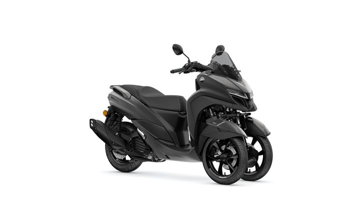 A sleek black three-wheeled scooter with a streamlined design, featuring a transparent windscreen and modern handlebars.
