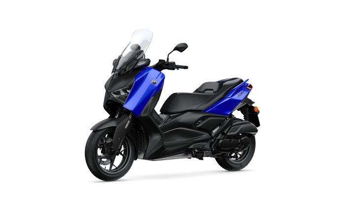A blue and black scooter with a windshield, sleek design, and a low seat, positioned on a white background.