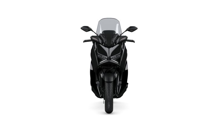 A front view of a sleek, modern black scooter with a transparent windshield, featuring angular headlights and a wide tire.