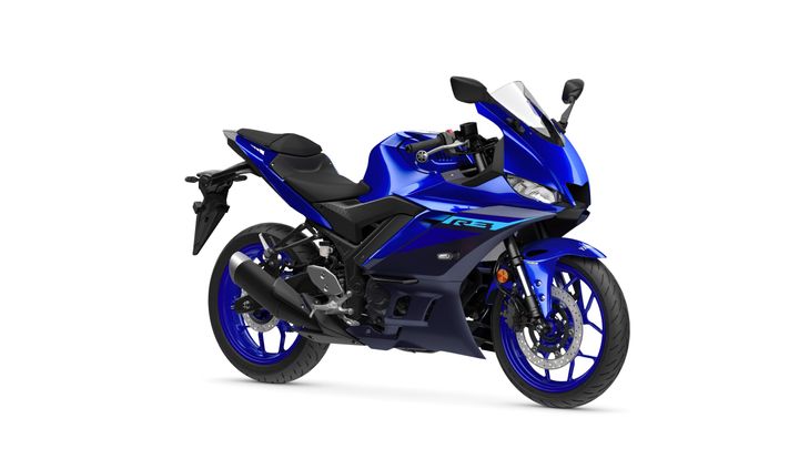 Yamaha 2024 R3 A blue Yamaha YZF-R125 motorcycle, featuring a sleek design, sporty seat, and advanced fairing, positioned on a white background.
