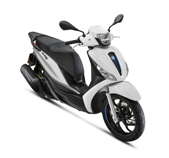 A stylish white scooter with a sleek design, featuring a black seat, front fairing, and sporty wheels, positioned at a slight angle to showcase its features.