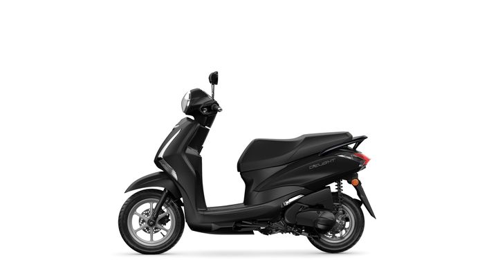 A sleek black scooter with a modern design, shown from a side angle, featuring a low seat, stylish bodywork, and large wheels.