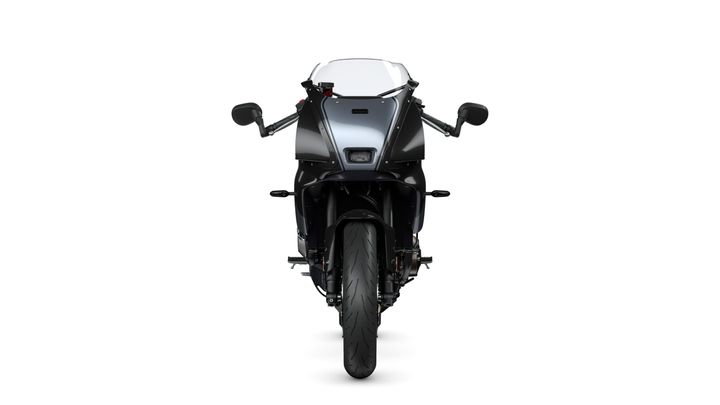 A sleek black motorcycle is shown from the front, featuring a modern design with angular bodywork, a windscreen, and prominent side mirrors. The front wheel is visibly detailed, displaying tread patterns. The background is pure white, emphasizing the motorcycle's design.