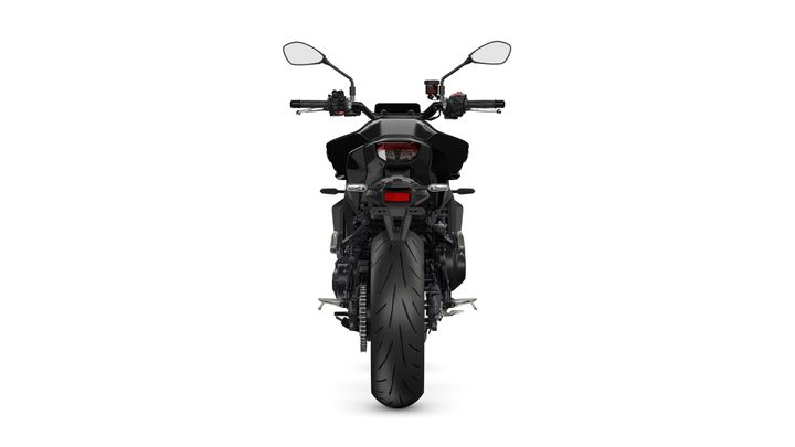 A rear view of a black motorcycle showcasing its sleek design, prominent rear tire, and handlebars with controls. The background is plain white.