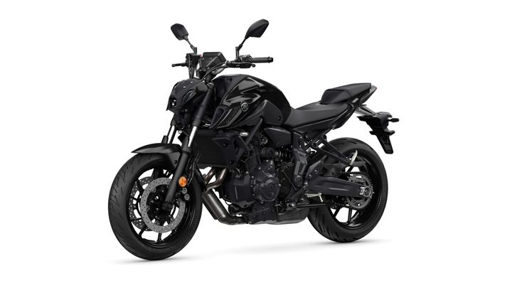 A sleek black motorcycle with a modern design, featuring a prominent headlight, sporty frame, and wide tires. The bike is positioned at an angle to showcase its details, including the angular bodywork and minimalist rear section.