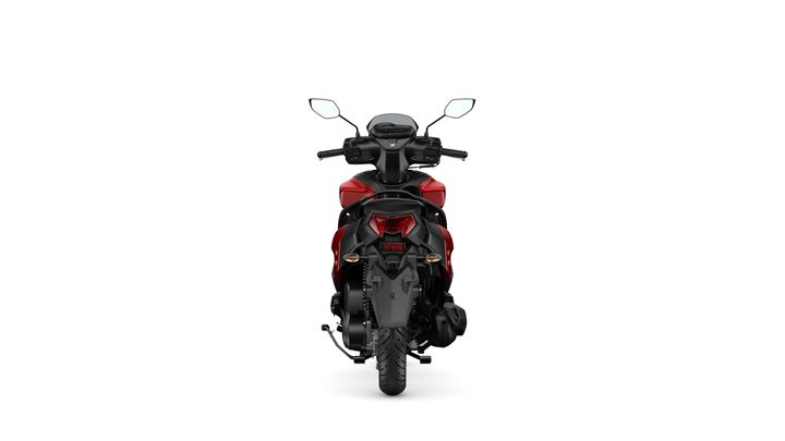 A rear view of a red and black scooter with a sleek design, showcasing its handlebars, mirrors, and rear lights against a white background.