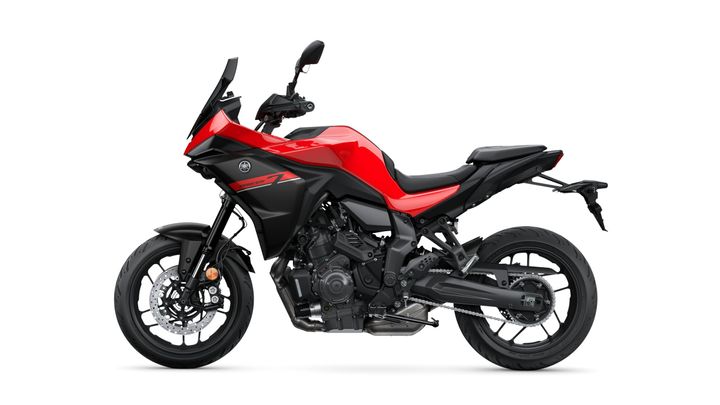 A red and black Yamaha motorcycle displayed from a side view, showcasing its sporty design, angular lines, and prominent features.