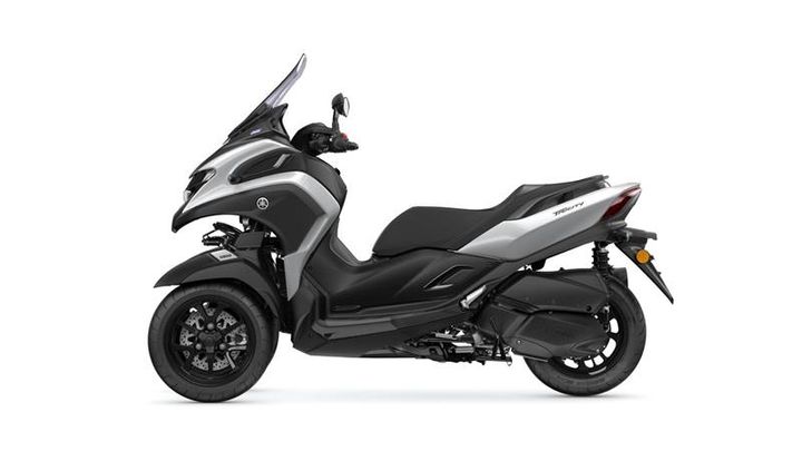 A sleek black and silver scooter with a modern design, equipped with a windscreen and large wheels, shown from the side on a white background.