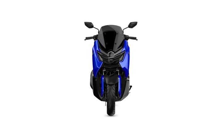 A blue and black motorcycle, viewed from the front, showcasing its sleek design and prominent headlight features.
