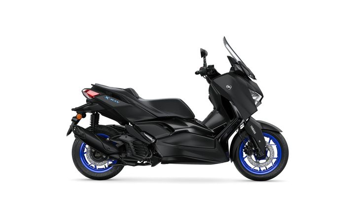 A sleek, black Yamaha XMAX scooter viewed from the side, featuring blue accents on the wheels and a sporty design.