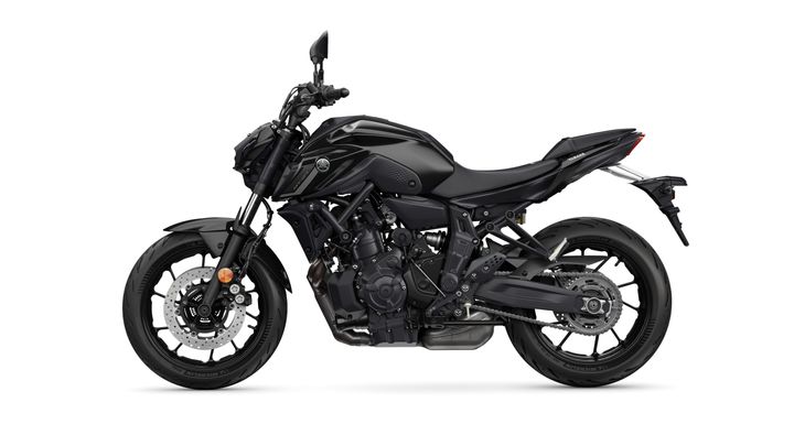 A sleek black Yamaha motorcycle displayed side-on, showcasing its modern design, angular bodywork, and sporty wheels.