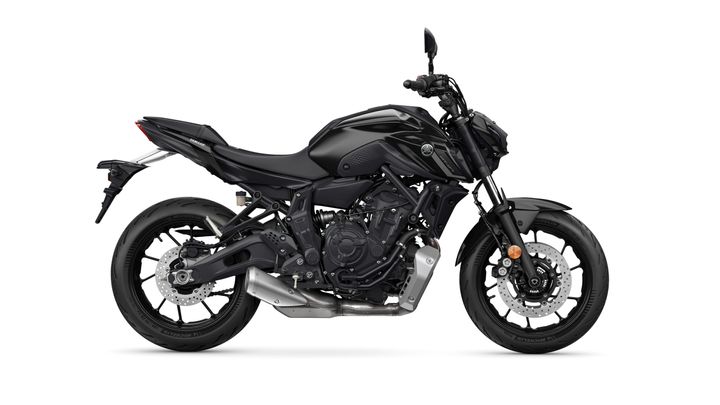 A black Yamaha motorcycle is shown in a side profile view, showcasing its sleek design, angular bodywork, and exposed engine components. The motorcycle features a sporty look with a low seat, a prominent exhaust pipe, and stylish wheels.