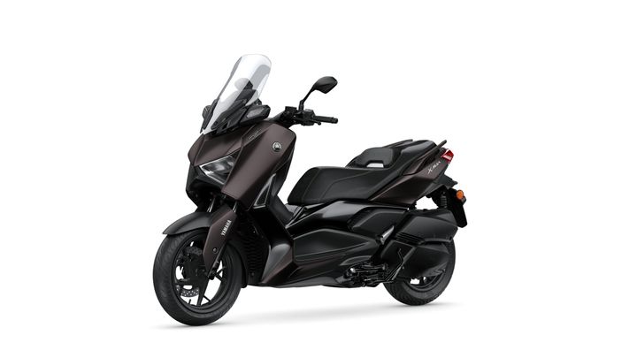 A dark brown scooter with a sleek design, clear windshield, and stylish seat, positioned on a white background.