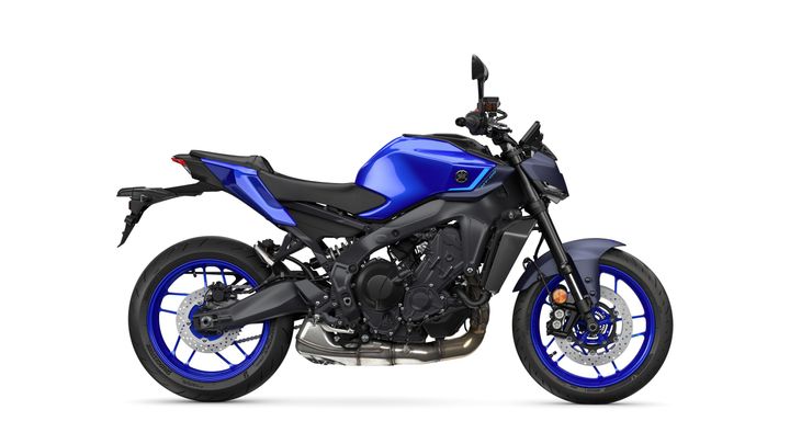 A blue Yamaha naked motorcycle with a sleek design, featuring a low seat, standard handlebars, and sport-style wheels, positioned on a white background.