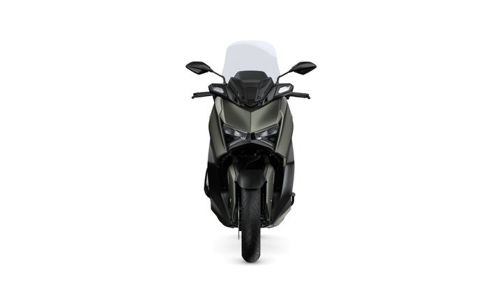 A sleek, modern motorcycle scooter with a dark olive green body, dual headlights, and a windshield, viewed head-on.