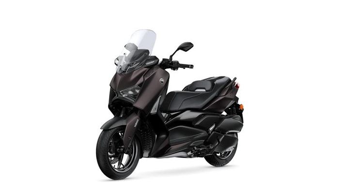 A sleek, modern scooter in dark color with a windshield, showcasing a stylish design and spacious seating.