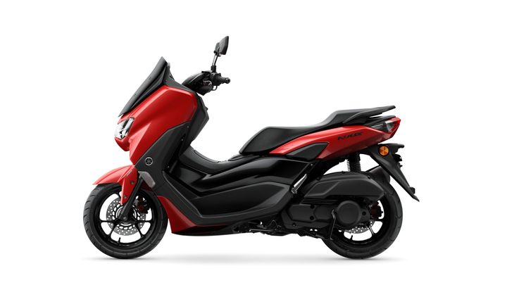 A side view of a red scooter with a sleek design, featuring a black seat and black elements on the body.