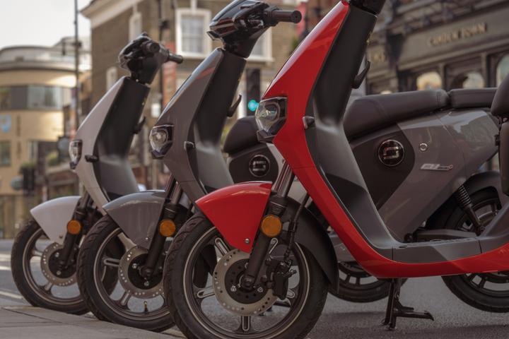 Three Super Soco CU Mini's lined up in the streets of Camden