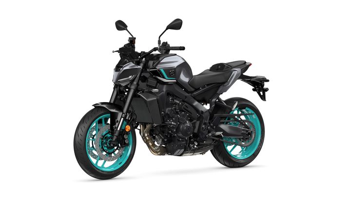 A sleek, modern motorcycle with a black and gray body, featuring distinctive turquoise wheels and accents, positioned to showcase its sporty design.