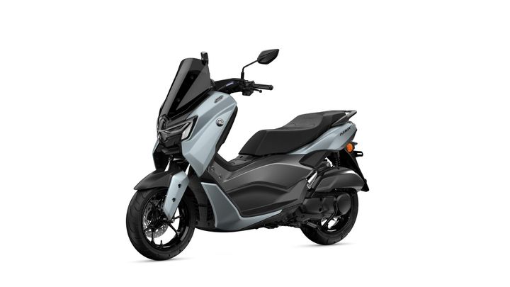 A sleek gray and black scooter with a modern design, featuring a tall windshield, comfortable seat, and stylish front headlight.