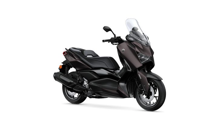 A sleek, modern black scooter with a tall windscreen, sporty design, and a low-profile seat, showcasing its stylish elements and robust tires.