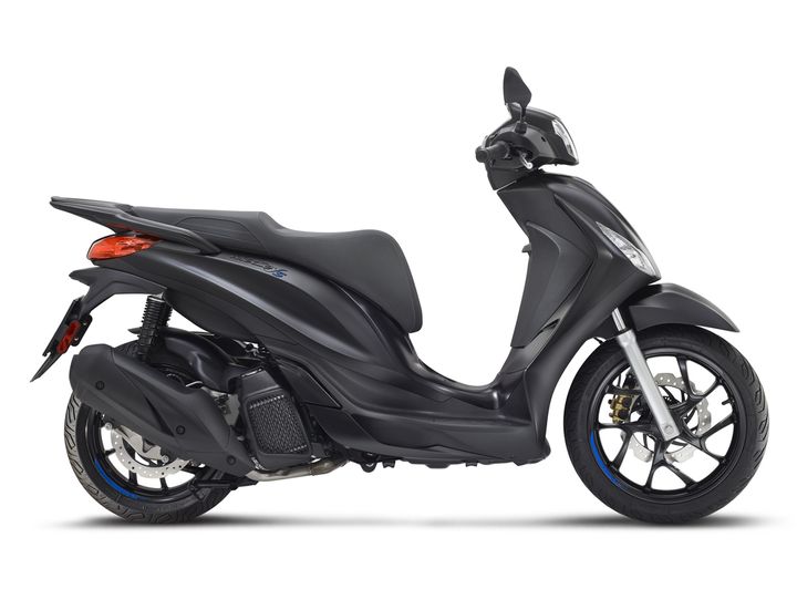 A sleek black scooter shown from the side, featuring a modern design with a comfortable seat, prominent front and rear wheels, and an elegant body contour.