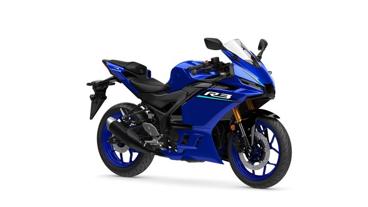 Yamaha 2026 R3 A blue Yamaha R3 motorcycle positioned at an angle, showcasing its sleek design, sporty style, and modern features.