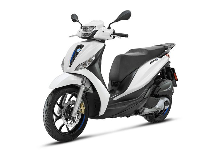 A sleek white scooter with a black seat, front headlight, and sporty design, featuring a stylish front fender and double-spoke wheels.
