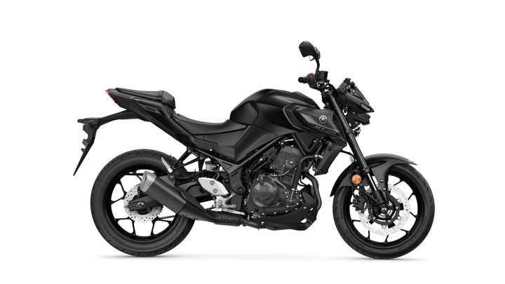 A sleek black Yamaha MT-03 motorcycle displayed from the side, showcasing its sporty design, dual exhaust, and modern features.