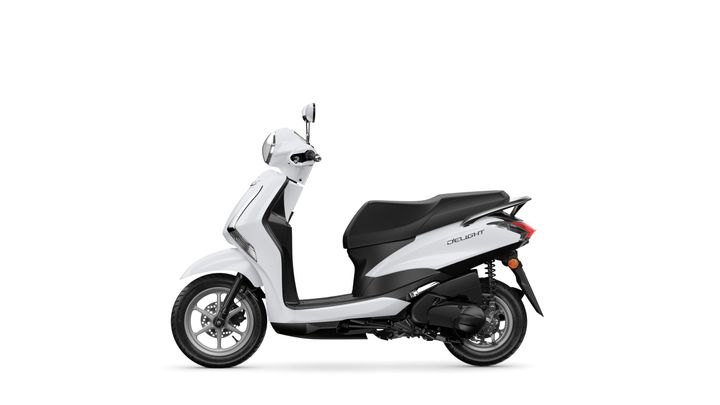 A modern white scooter with a sleek design, featuring a black seat, visible wheels, and rear suspension, displayed against a white background.