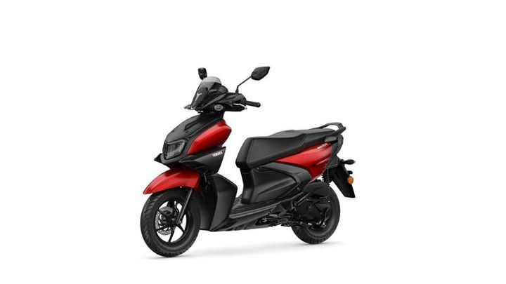 A red and black scooter with a sleek design, featuring a windshield, modern headlights, and a comfortable seat, positioned at an angle against a white background.