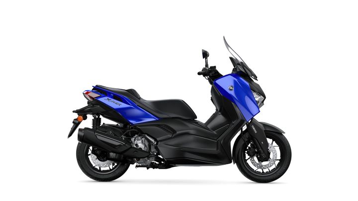 A blue Yamaha XMAX scooter is displayed in profile view, showcasing its sleek design, windshield, and sporty details.